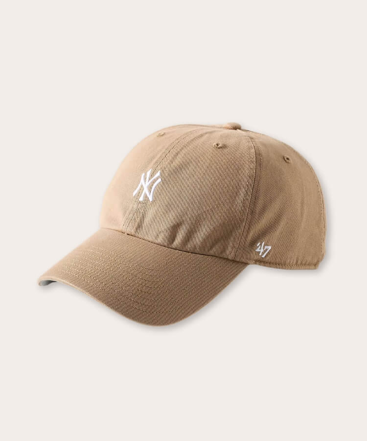 Navy blue NY Yankees baseball cap.