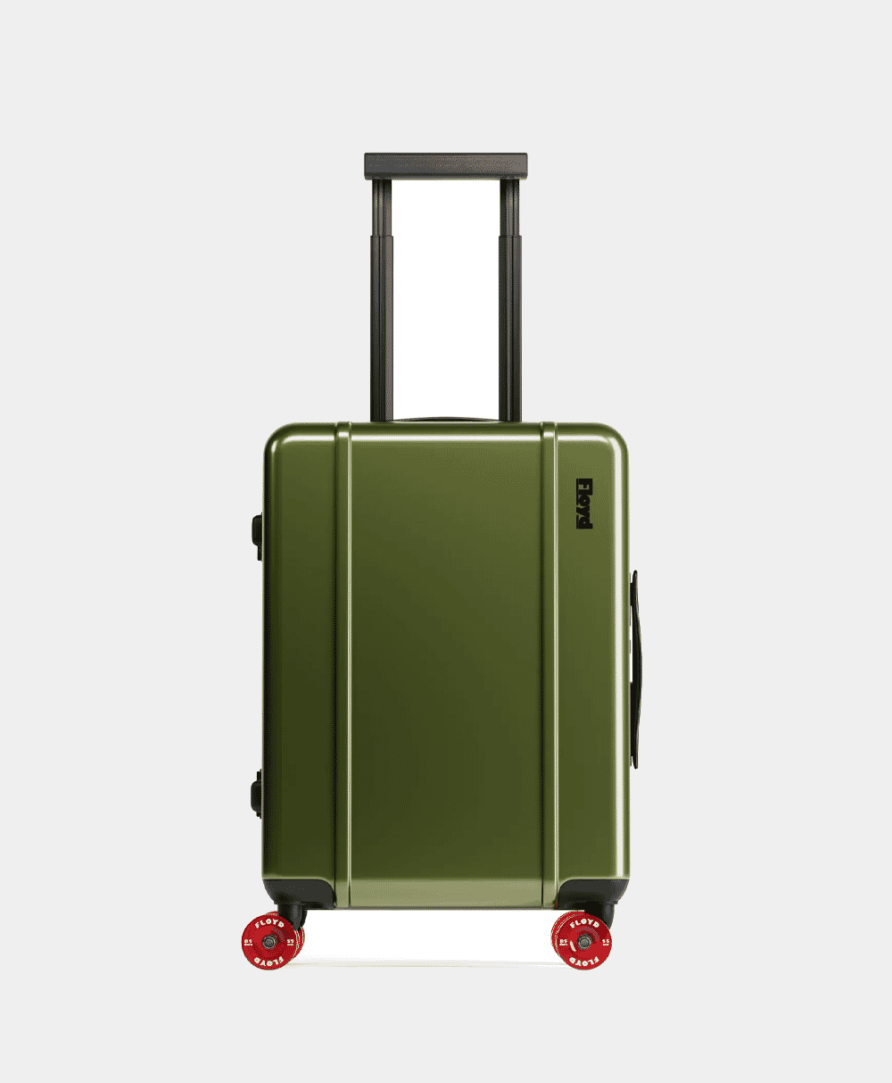 An olive green hardshell carry-on suitcase with vibrant red wheels on a white background.