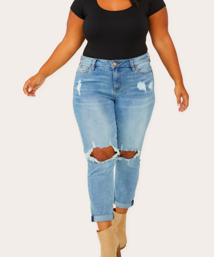 Light wash destructed jeans by Arula.