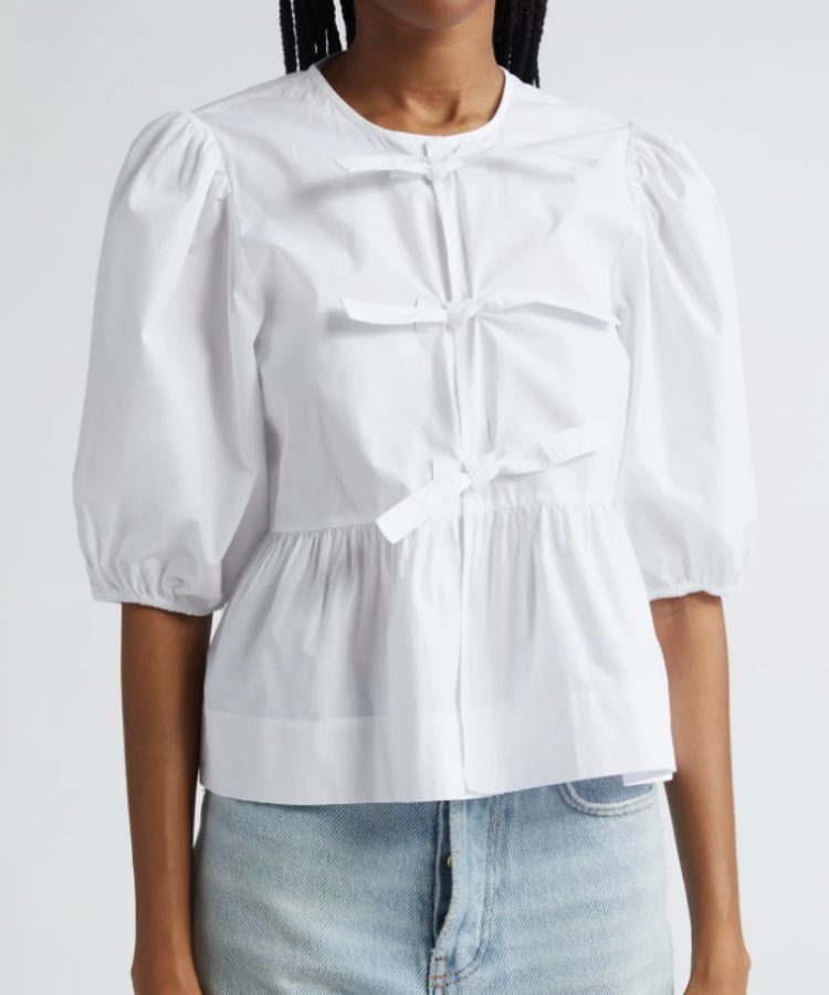 White puff-sleeve poplin blouse by Ganni.