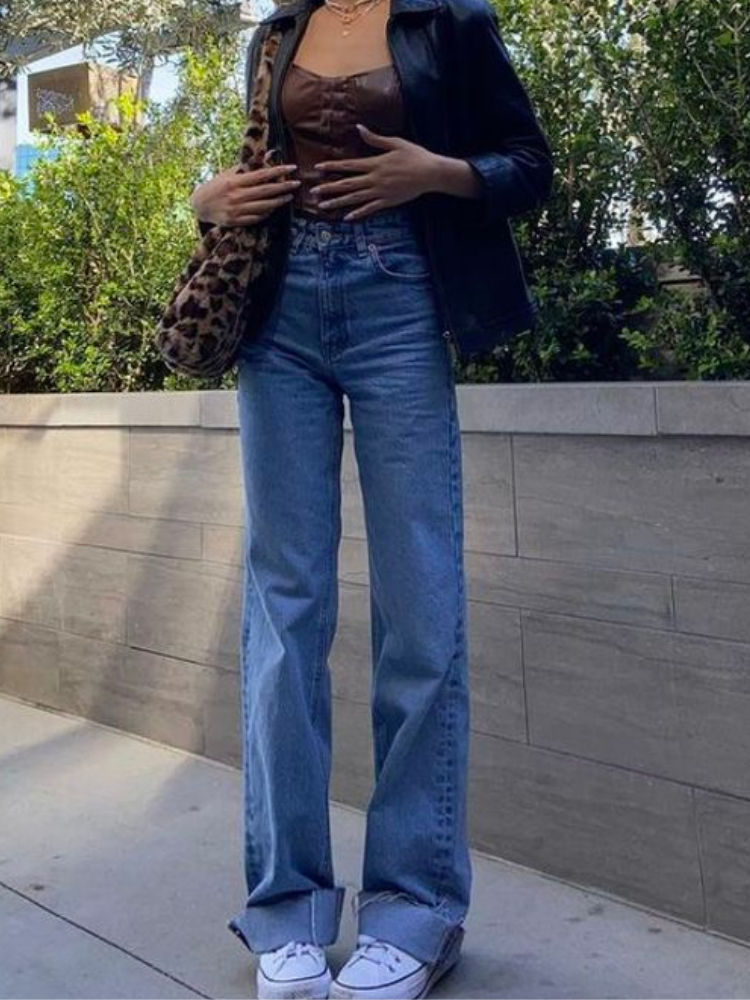 Pinterest aesthetic photo of a corset top and wide-leg jeans.