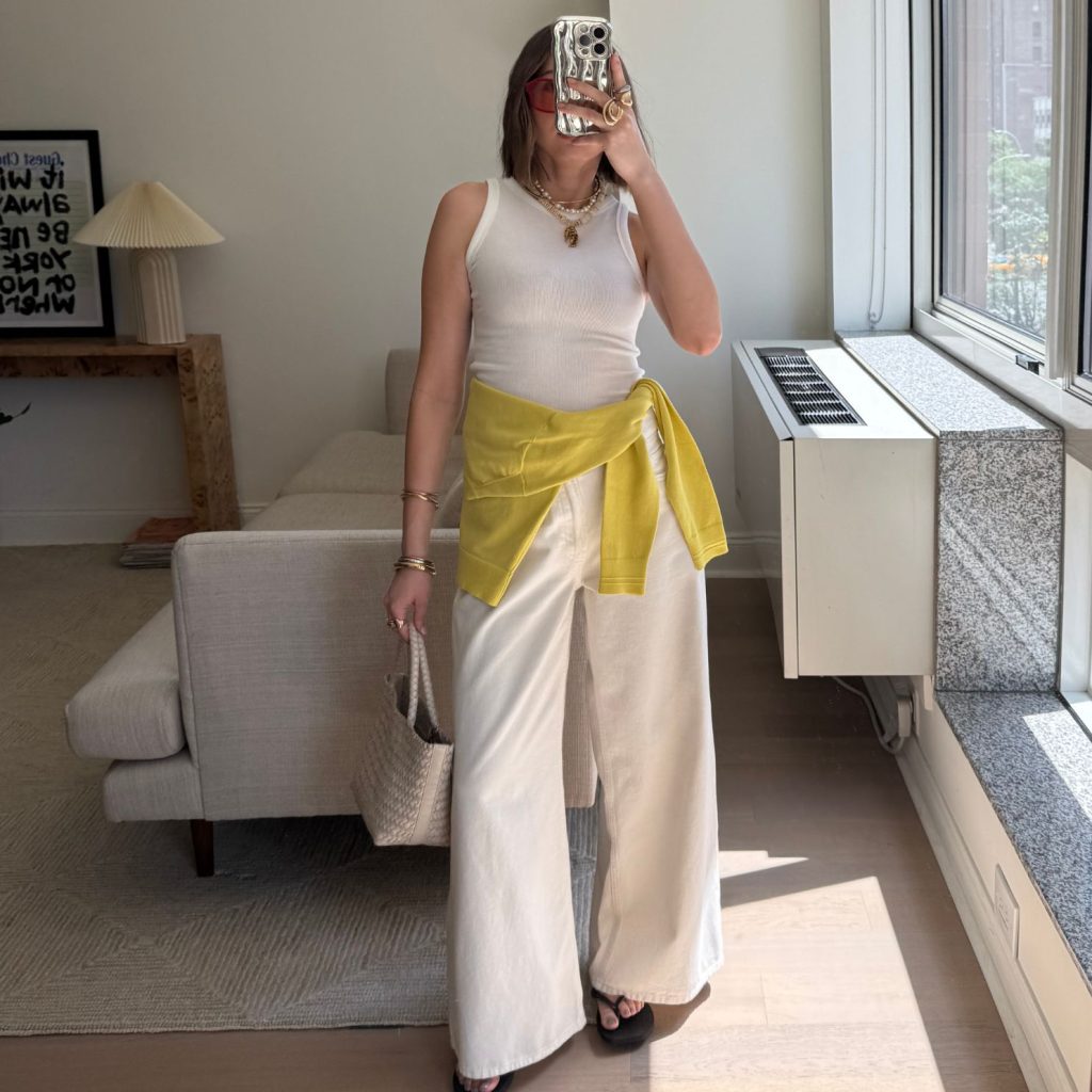 Tinsley Crisp styling a white tank top with statement accessories.