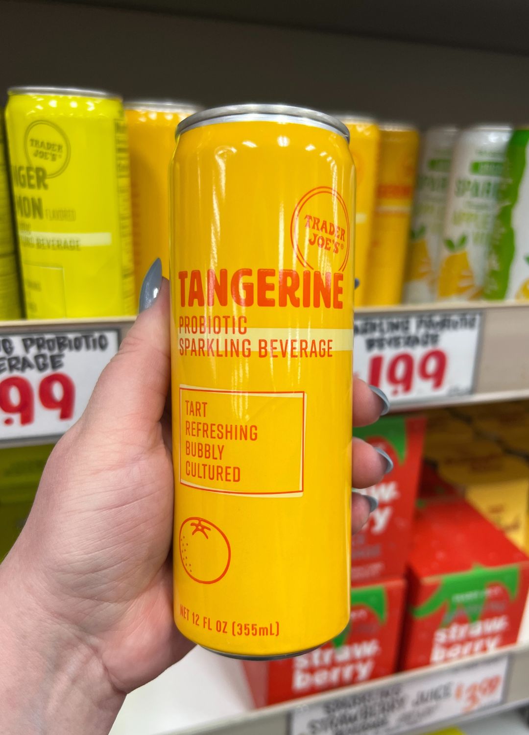 Can of Trader Joe's Tangerine Probiotic Sparkling Beverage.