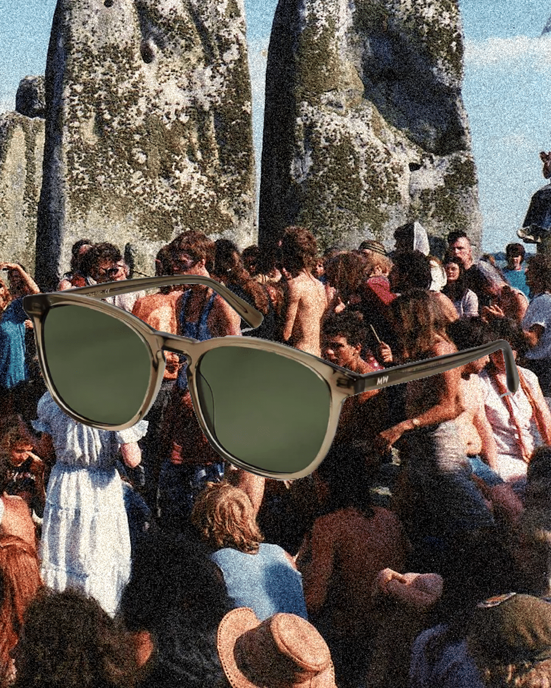 Tortoiseshell sunglasses with green lenses overlaid on a 1970s-style festival crowd at Stonehenge.
