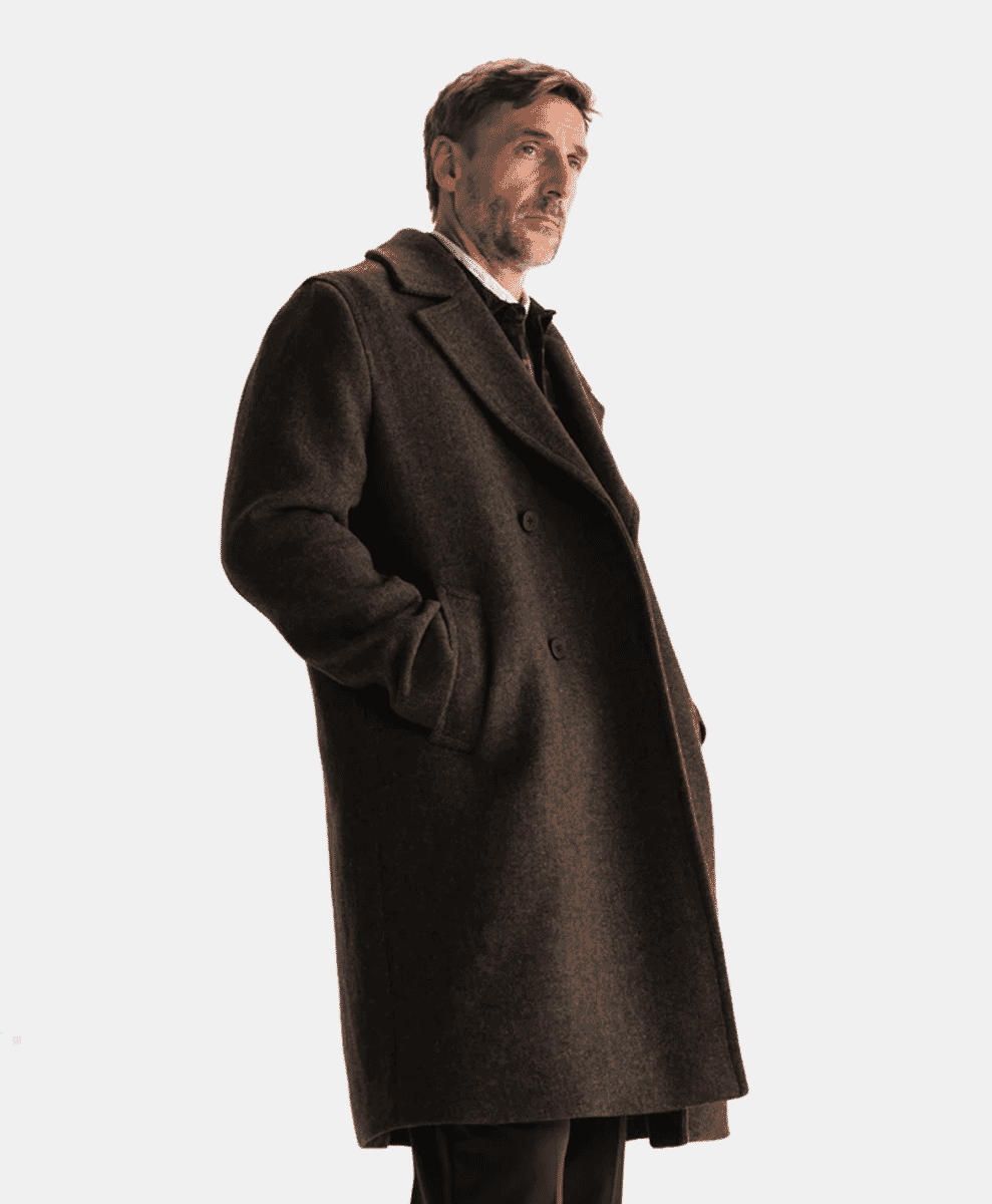 Profile shot of a man wearing a dark brown double-breasted wool overcoat.
