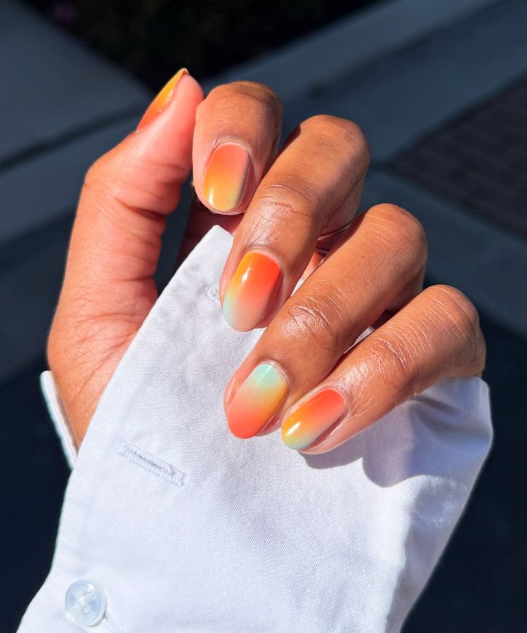 Macro shot of hot pink 3D jelly nail art with raised texture.