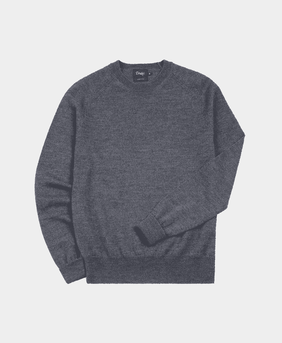 A dark grey melange merino wool crew neck jumper from Drakes.