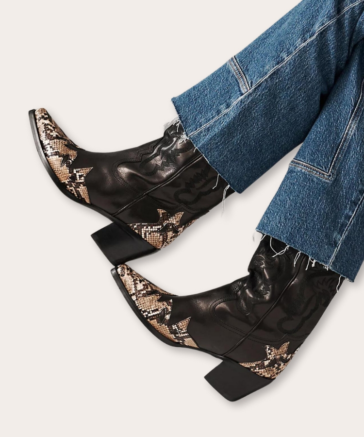 Jeffrey Campbell western boots with subtle stitching and hardware details.