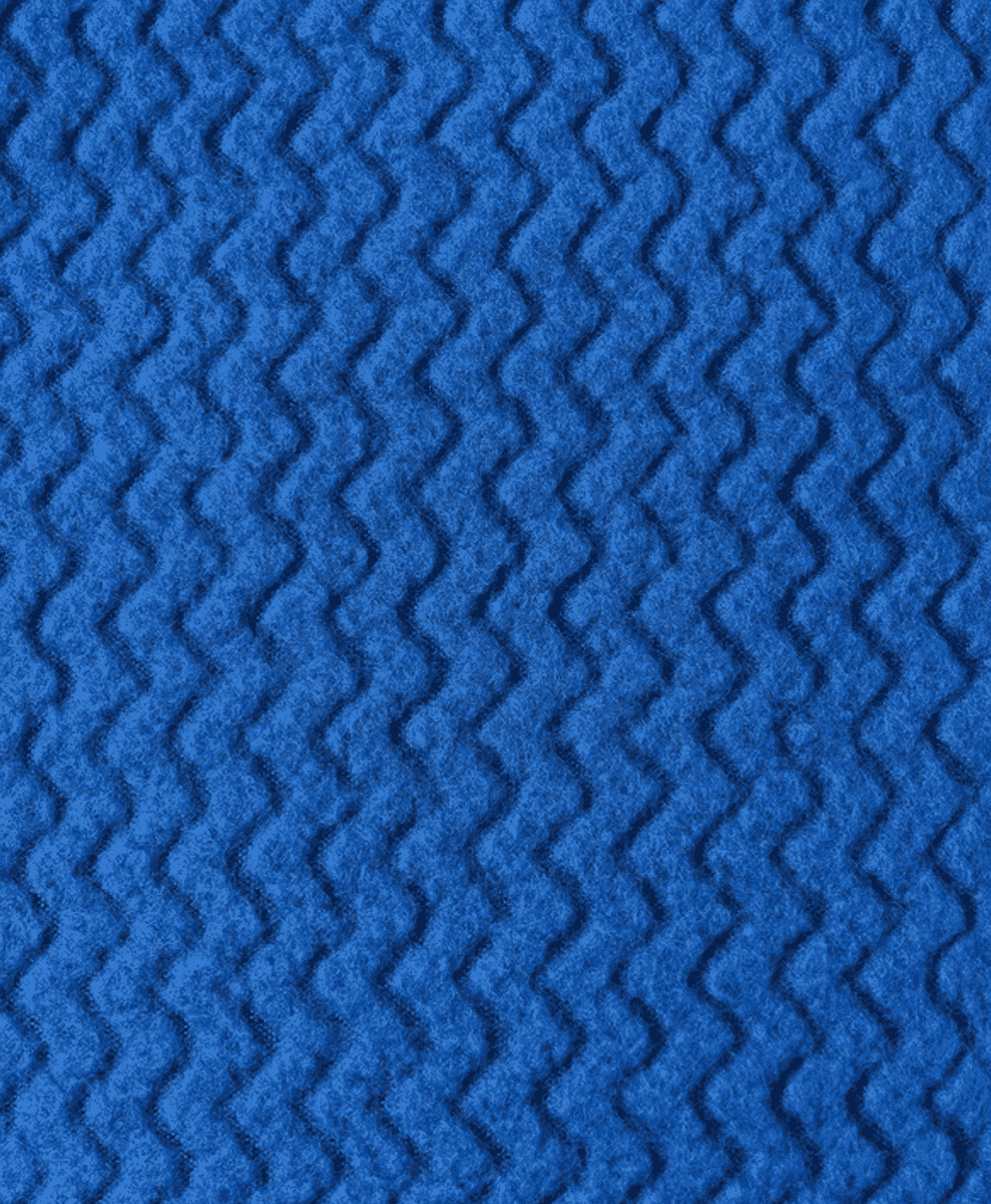 Close-up of blue technical fabric with a distinct zigzag textured pattern.
