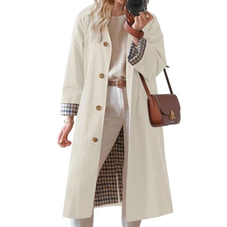 A classic beige double-breasted lined trench coat