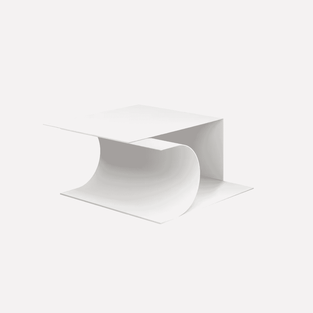 White abstract sculpture with flowing curves and geometric planes.