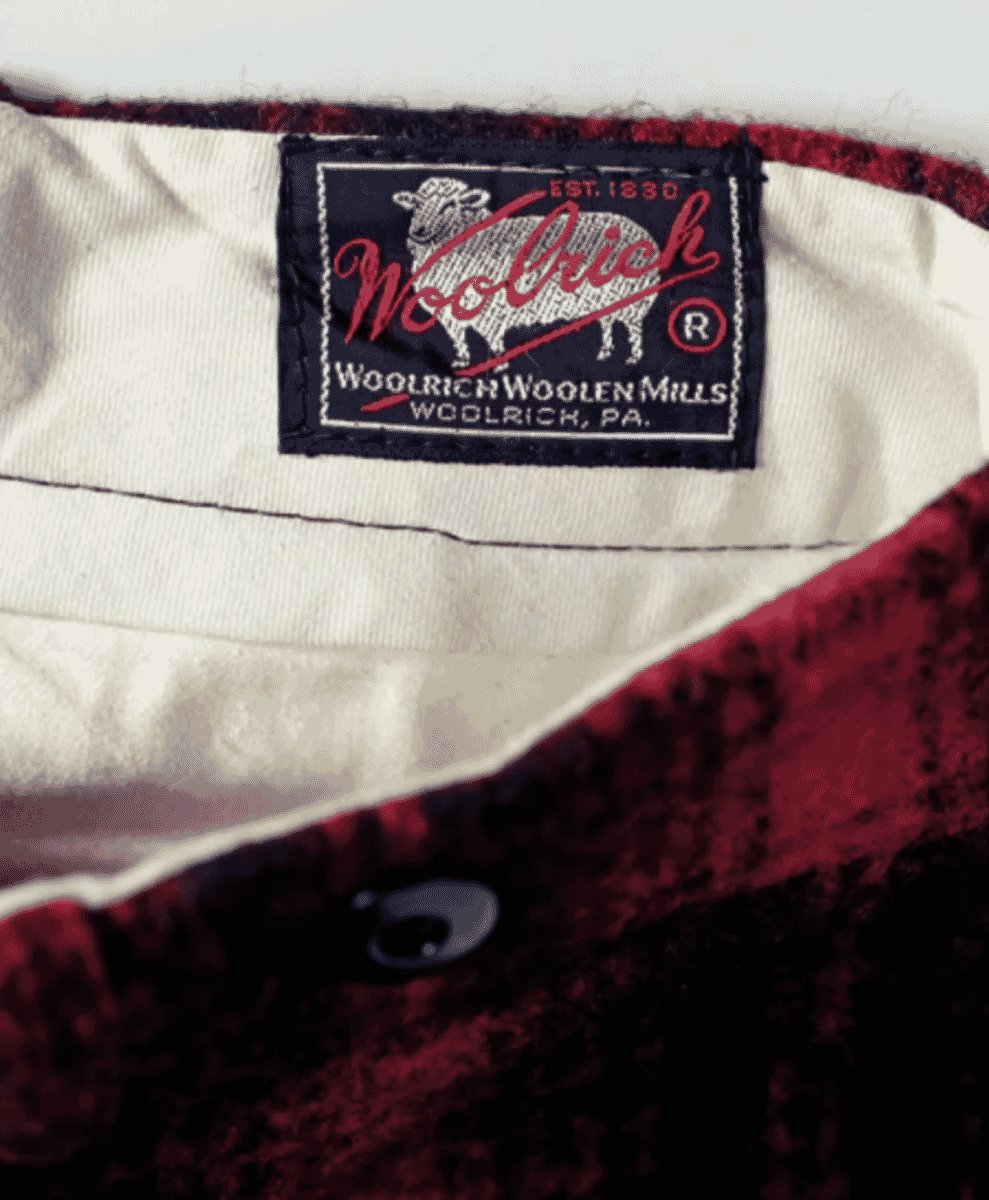 Close-up of a Woolrich waterproof jacket featuring heavy-duty construction.