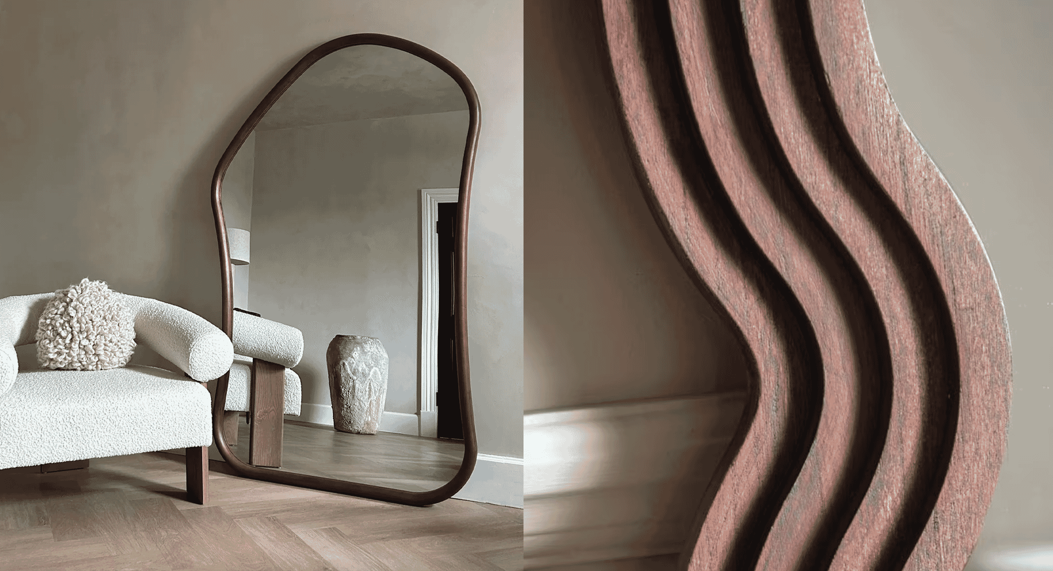 Modern interior with a wavy wood-framed mirror, white textured armchair, and herringbone floor.