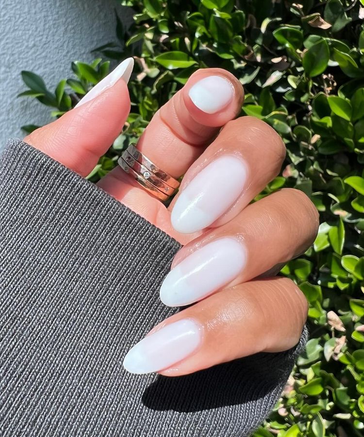 Translucent white jelly nails by @themaniclub.