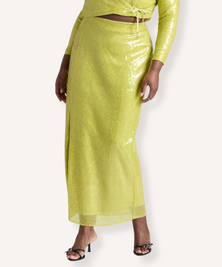 A midi-length column skirt covered in shimmering chartreuse sequins.