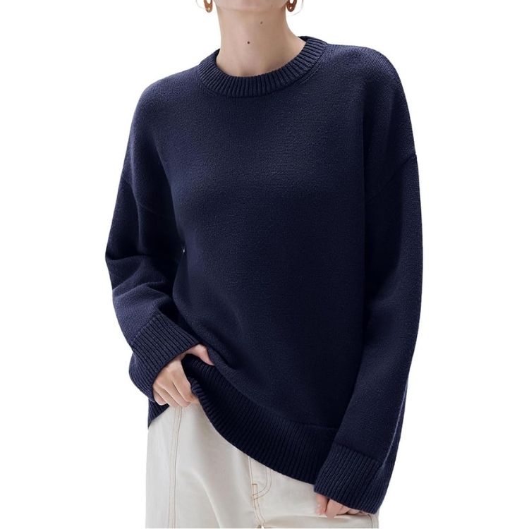 An oversized cashmere blend sweater in a neutral knit