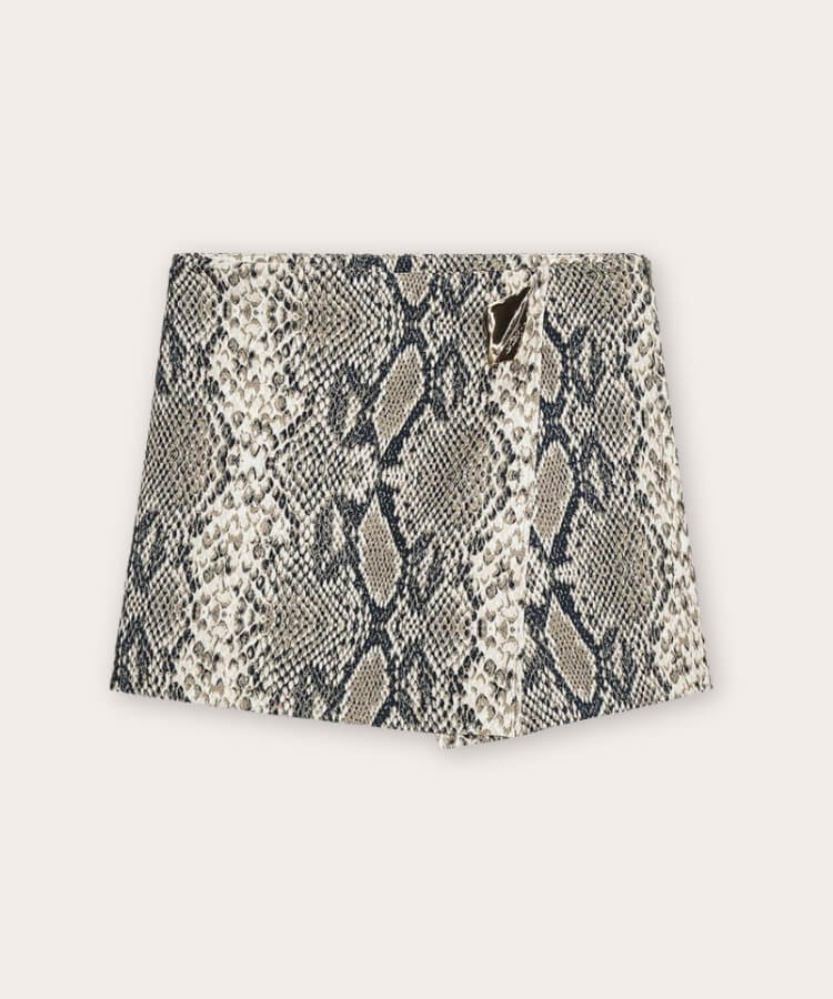 Zara asymmetrical culotte skirt featuring a detailed snake print pattern.