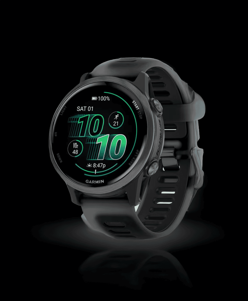 A Garmin smartwatch display showing VO2 max and workout metrics in green digital text.