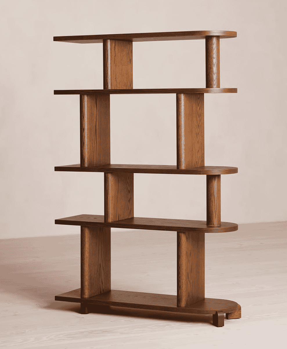 A modern wooden shelving unit with curved shelves and cylindrical supports against a neutral background.