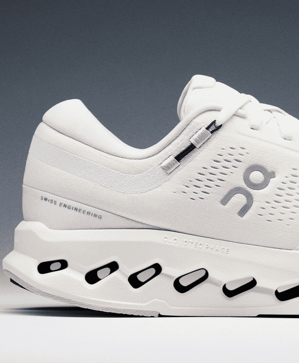 Close-up of the heel of a white On sneaker featuring 'SWISS ENGINEERING' text.