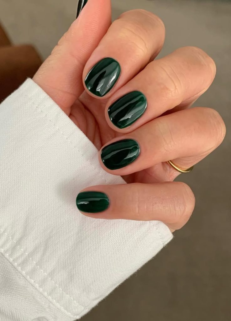 Olive green nails with a sophisticated matte or satin finish.