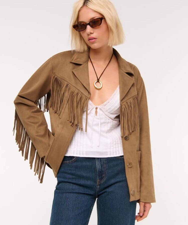 Abercrombie & Fitch Vegan Suede Fringe Jacket with long fringe along the arms.