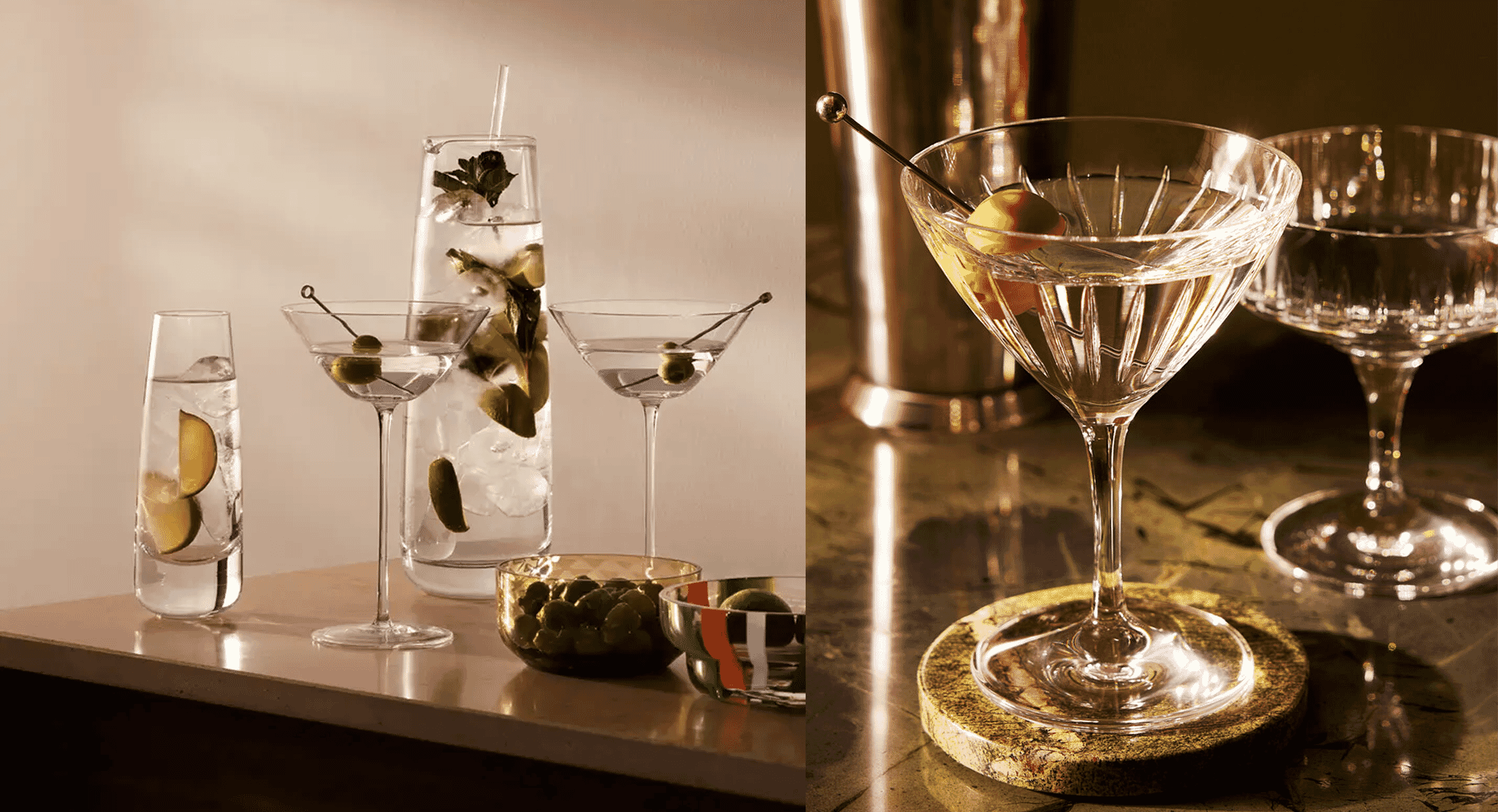 A stylish bar setup with carafes, martini glasses, and olives under warm lighting.