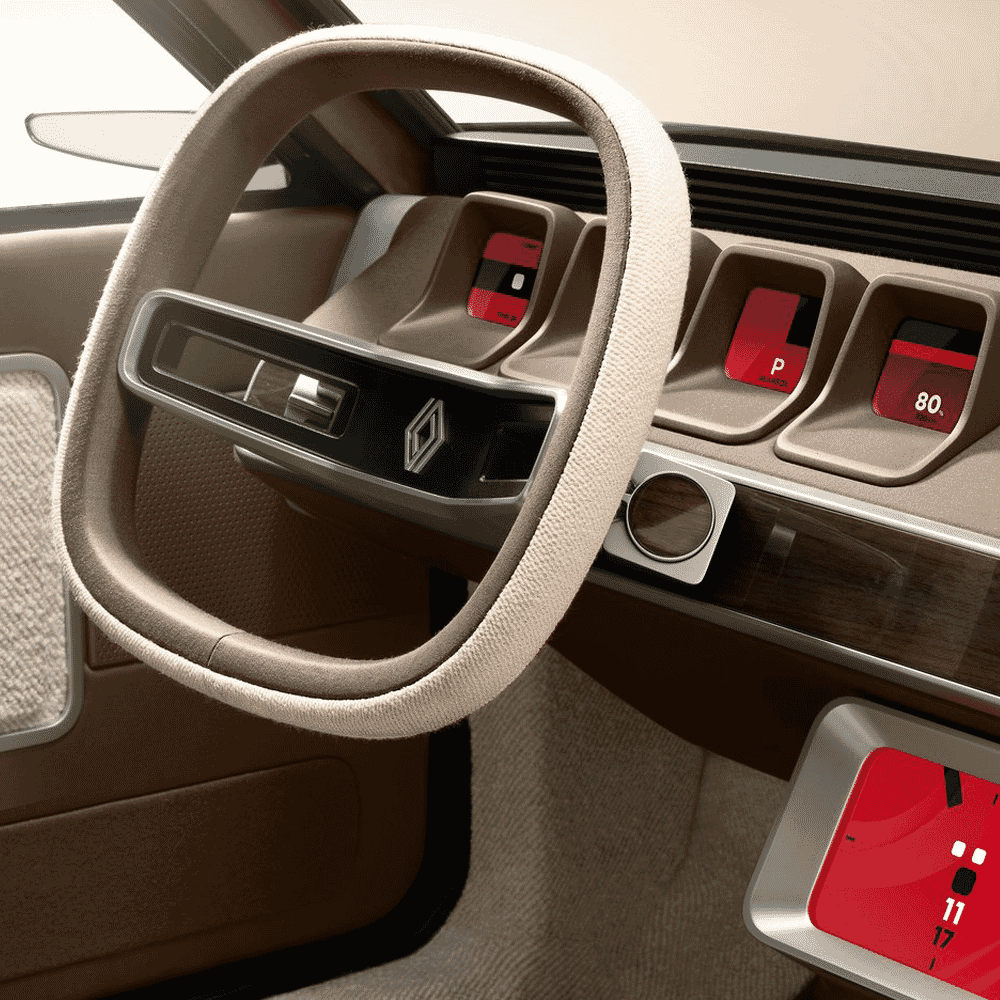 Interior view of the Renault R17 concept showing the steering wheel and square digital displays.