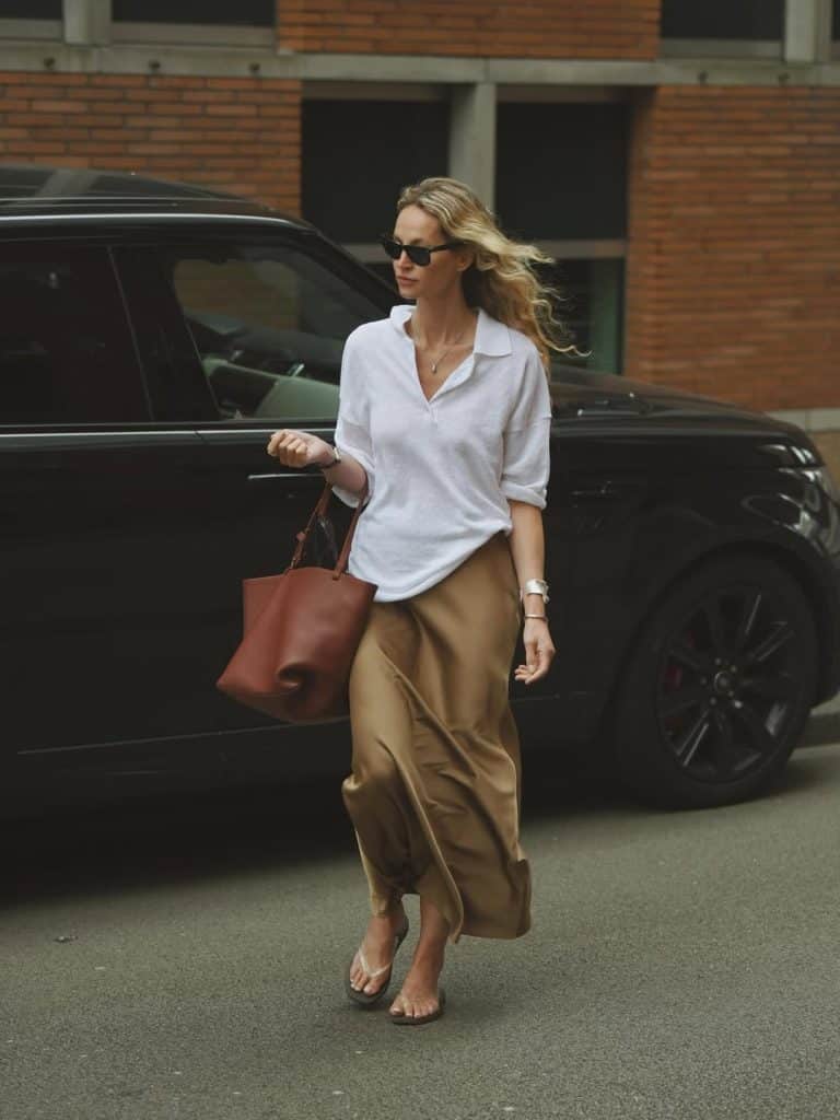 A woman wearing a matching beige neutral co-ord set.