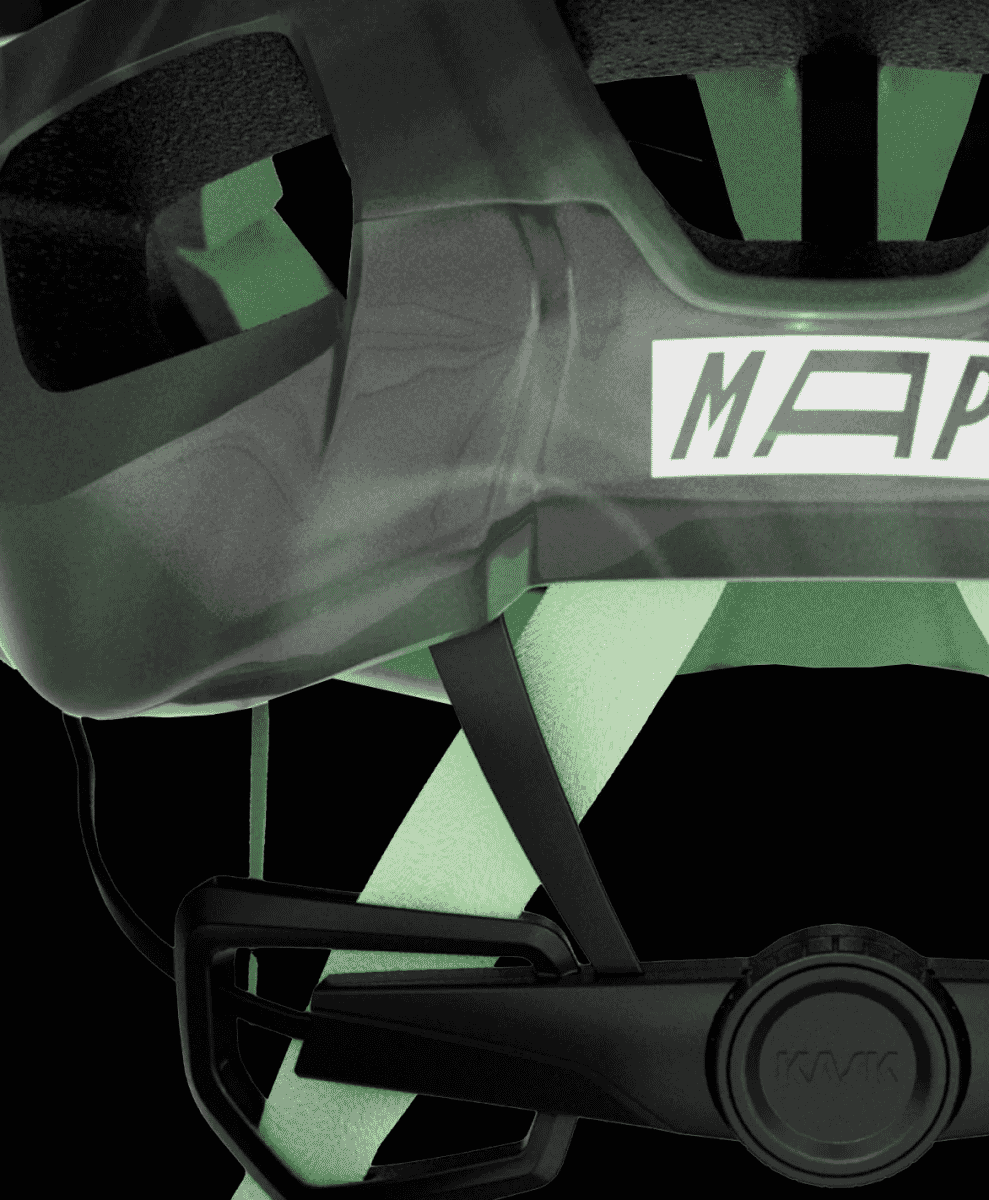 Close-up of a high-performance cycling helmet prominently displaying both MAAP and KASK brand logos.