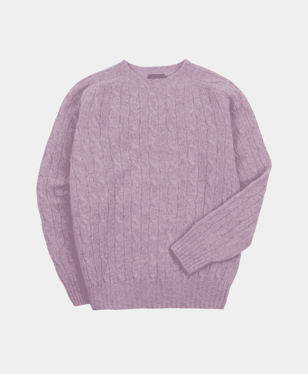 Flat lay of a lilac-colored brushed cable knit crew neck sweater.