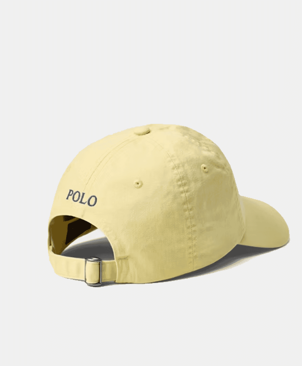 Back view of pale yellow cap with 'POLO' embroidery.