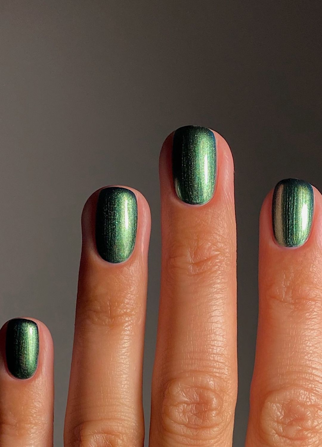 Sparkly green manicure by Matejanova.