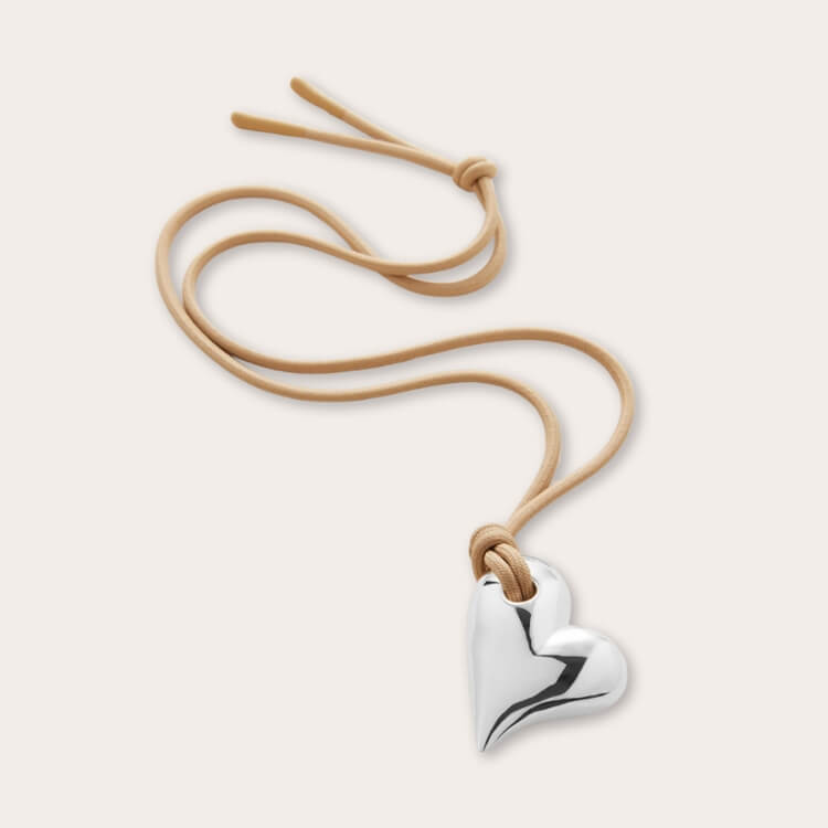 Jenny Bird Heart On a String silver pendant necklace.