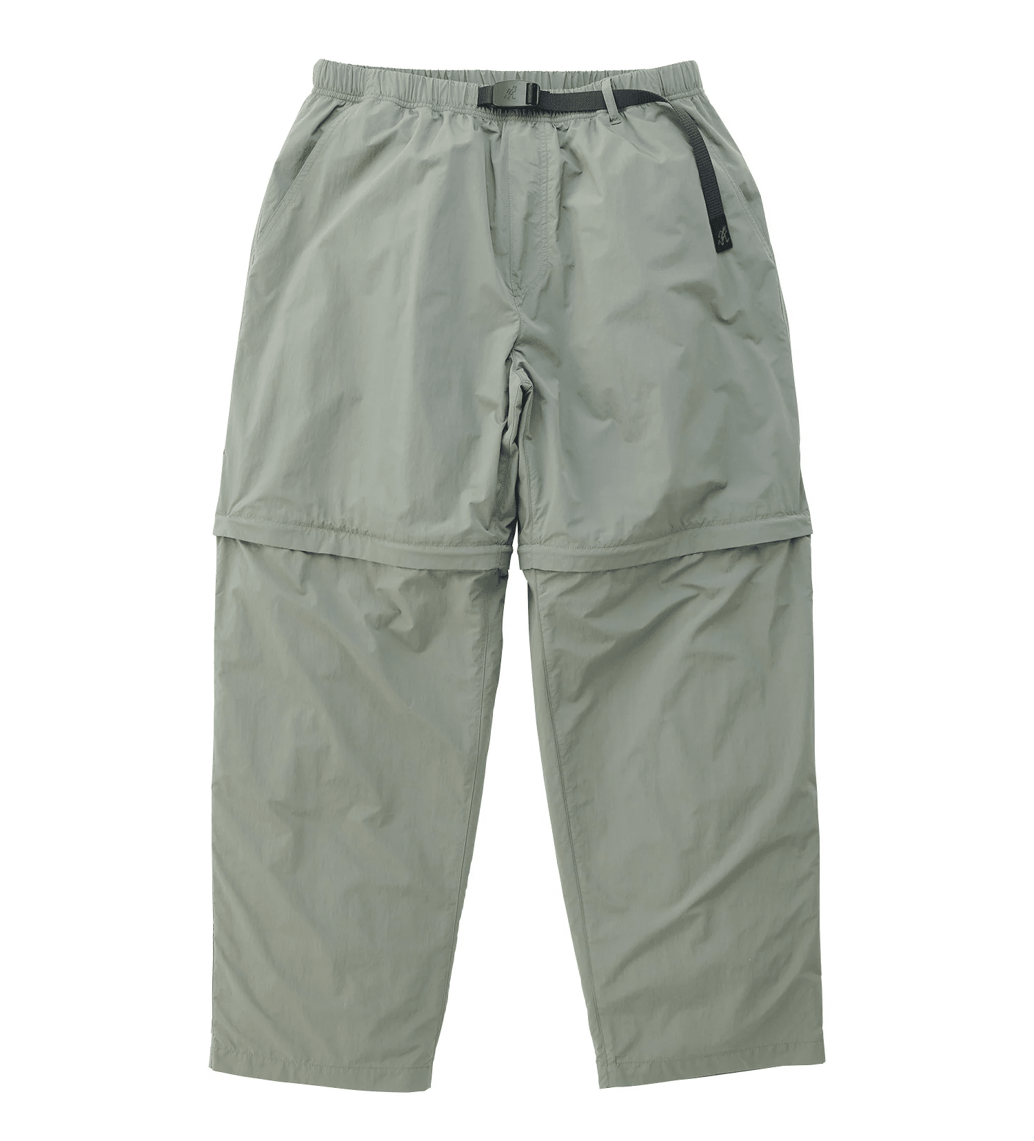Light gray Gramicci hiking pants featuring an integrated belt and zippered convertible legs.