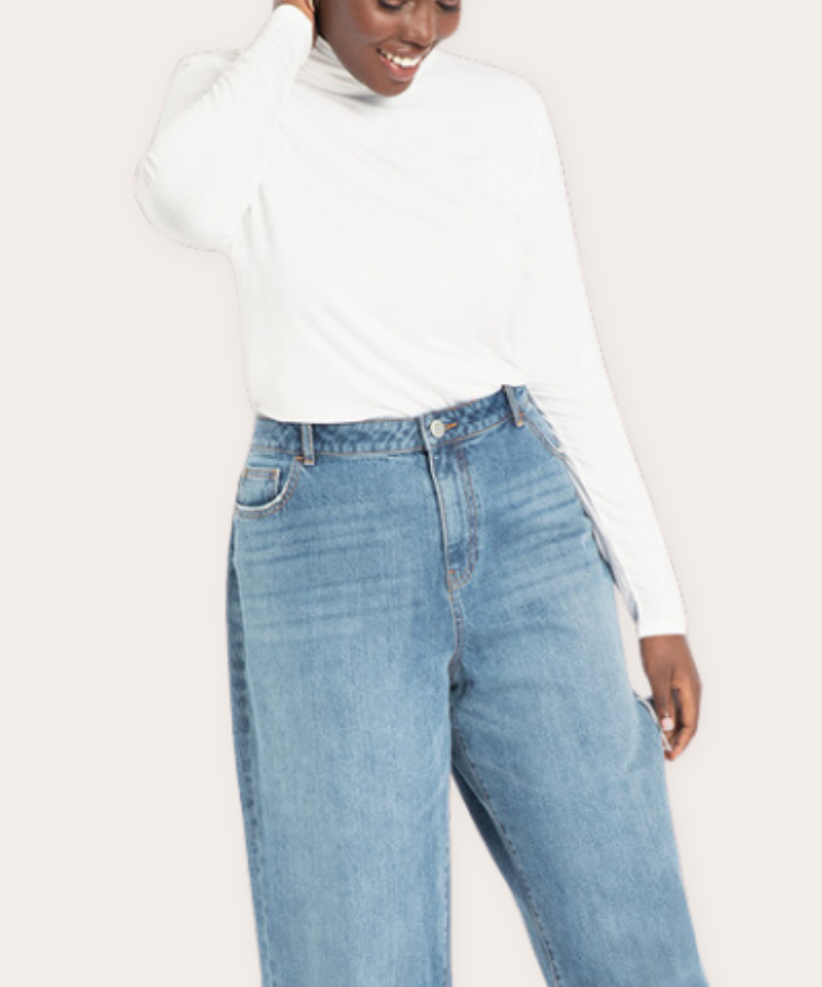 White Eloquii turtleneck top.