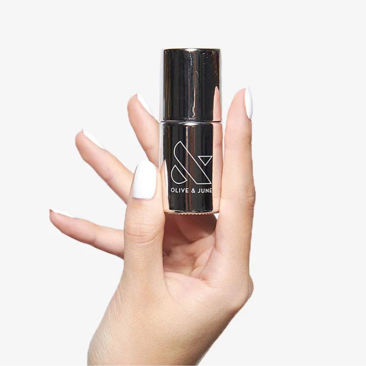 Olive & June Super Glossy Top Coat bottle.