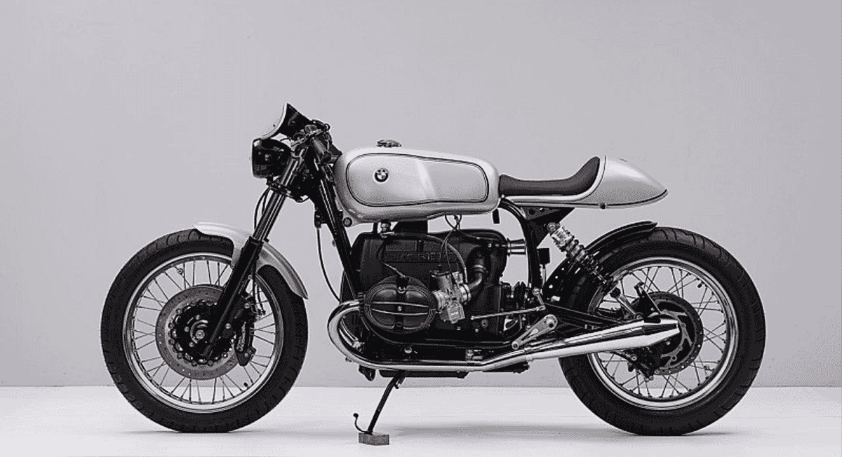 Monochrome studio shot of the Renard R100 prototype motorcycle showing its streamlined design.