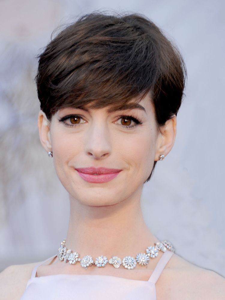 A voluminous, bouncy blowout on dark brown hair from a Getty red carpet archive.