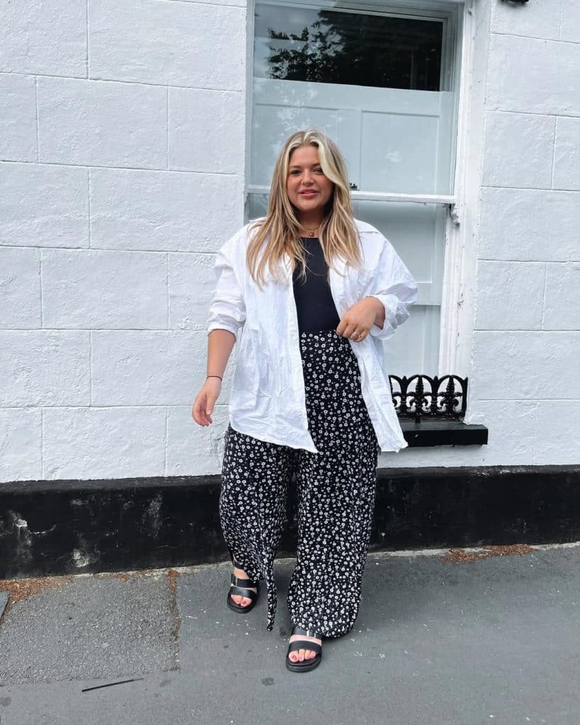 Petite plus-size woman wearing a wrap-style dress.