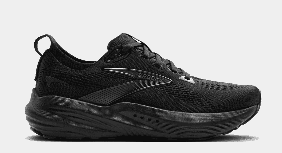 Sleek all-black Brooks running shoe with mesh upper and branding details.