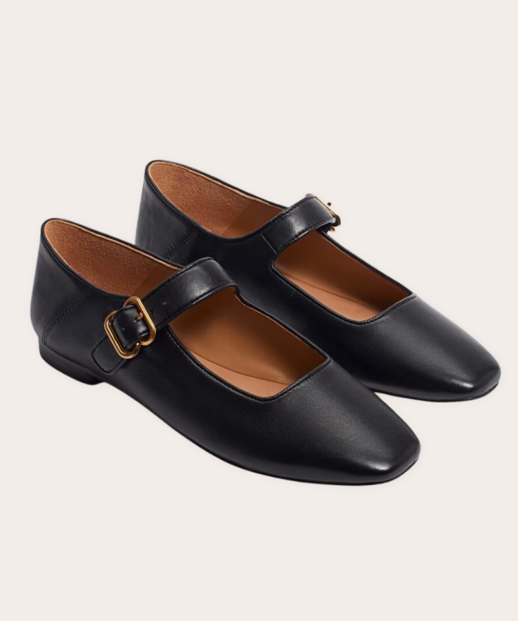Black Mary Jane flats.
