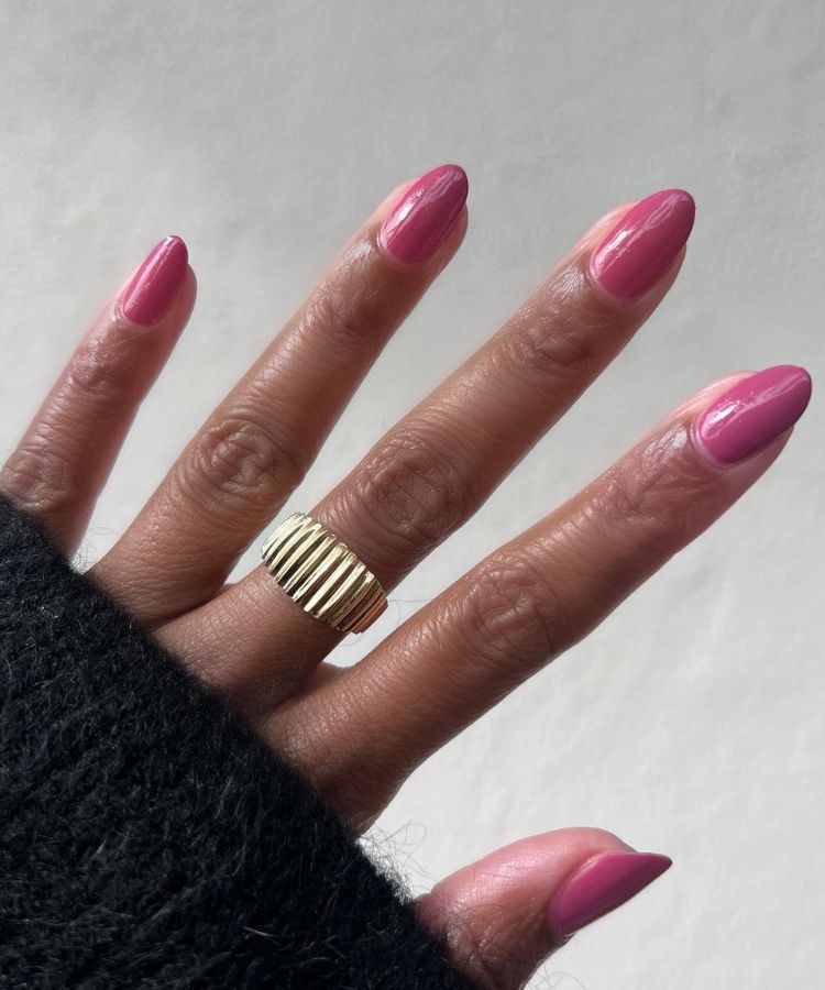 Elegant mauve manicure on manicured hands.