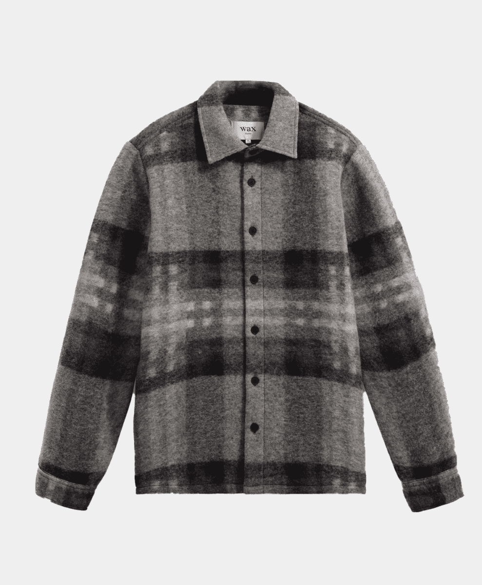 A grey and black plaid wool overshirt by Wax London displayed flat.