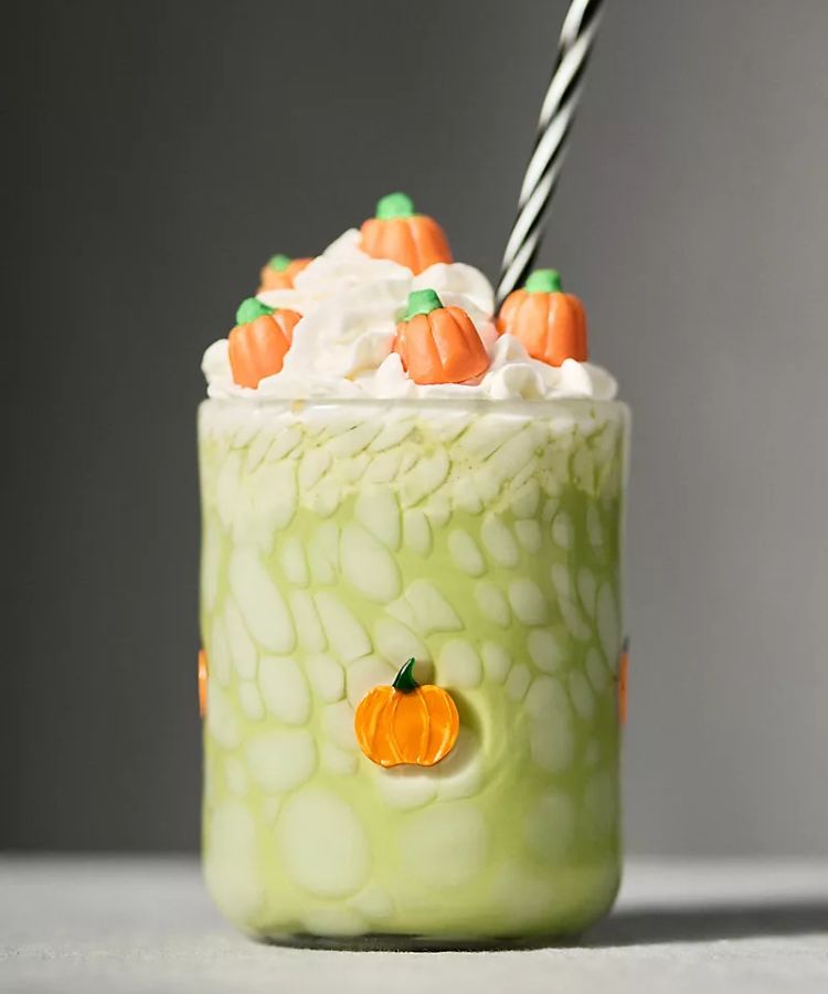 Anthropologie Pumpkin Juice Glass in amber-tinted glass.