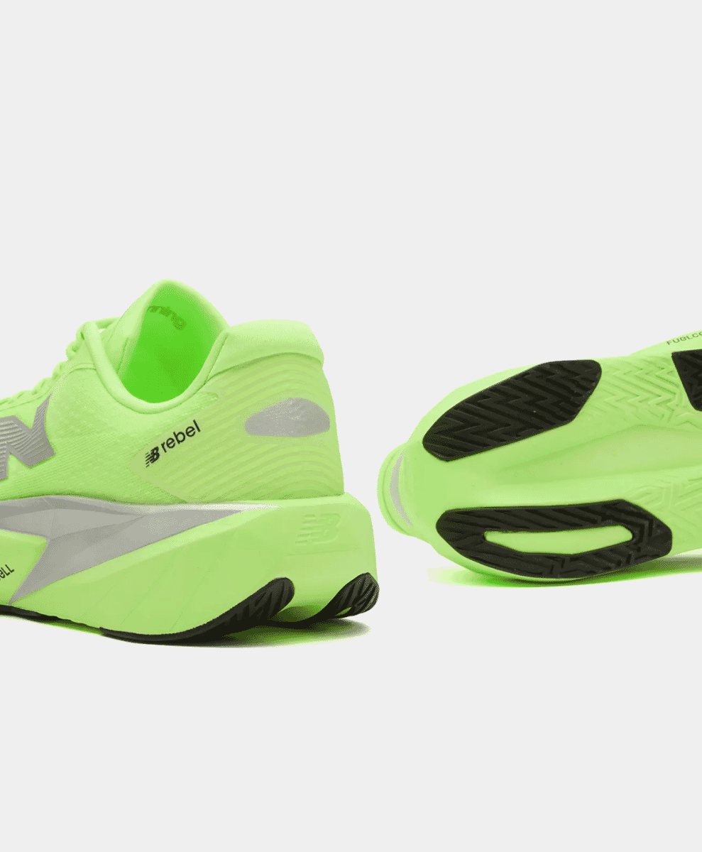 Side and sole view of neon green New Balance Fuelcell Rebel v5 running sneakers.