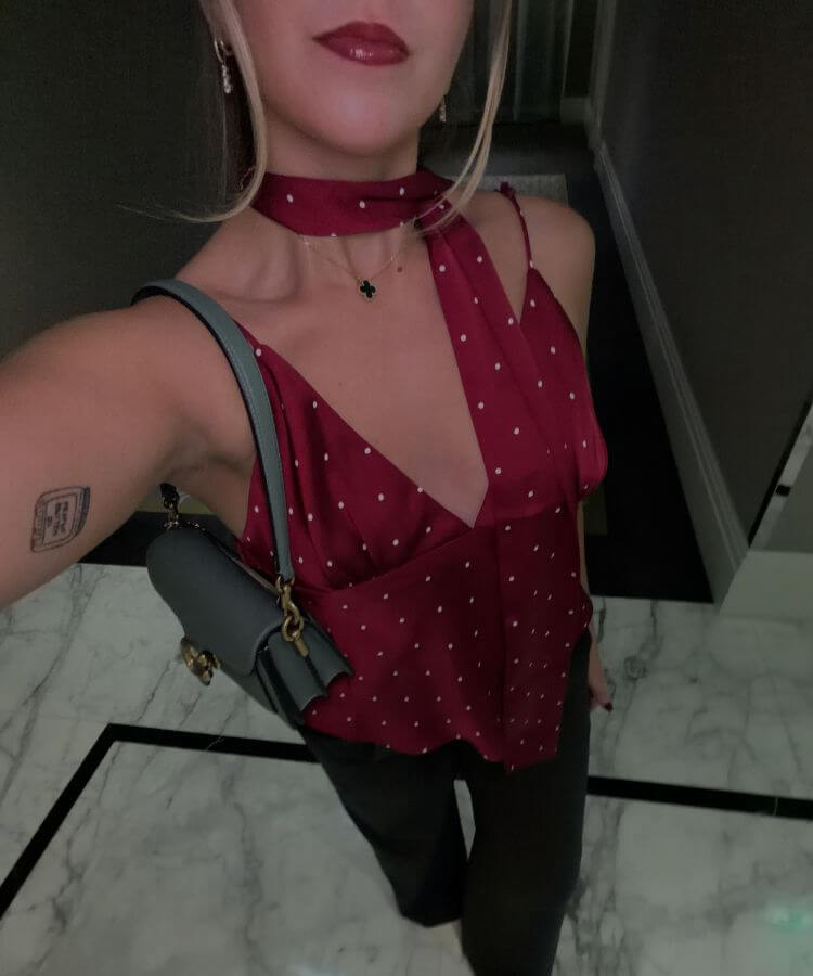 Detailed shot of a chic polka dot outfit for New Year's Eve