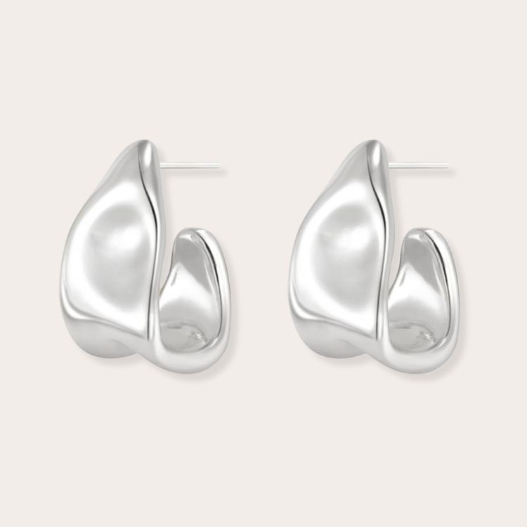 Chunky Silver Earrings in a teardrop shape.