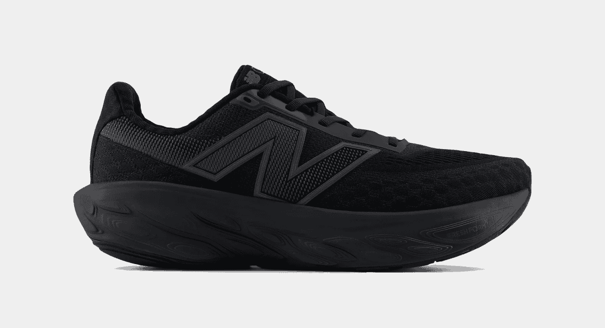 All-black New Balance running shoe with textured knit and sculpted midsole.