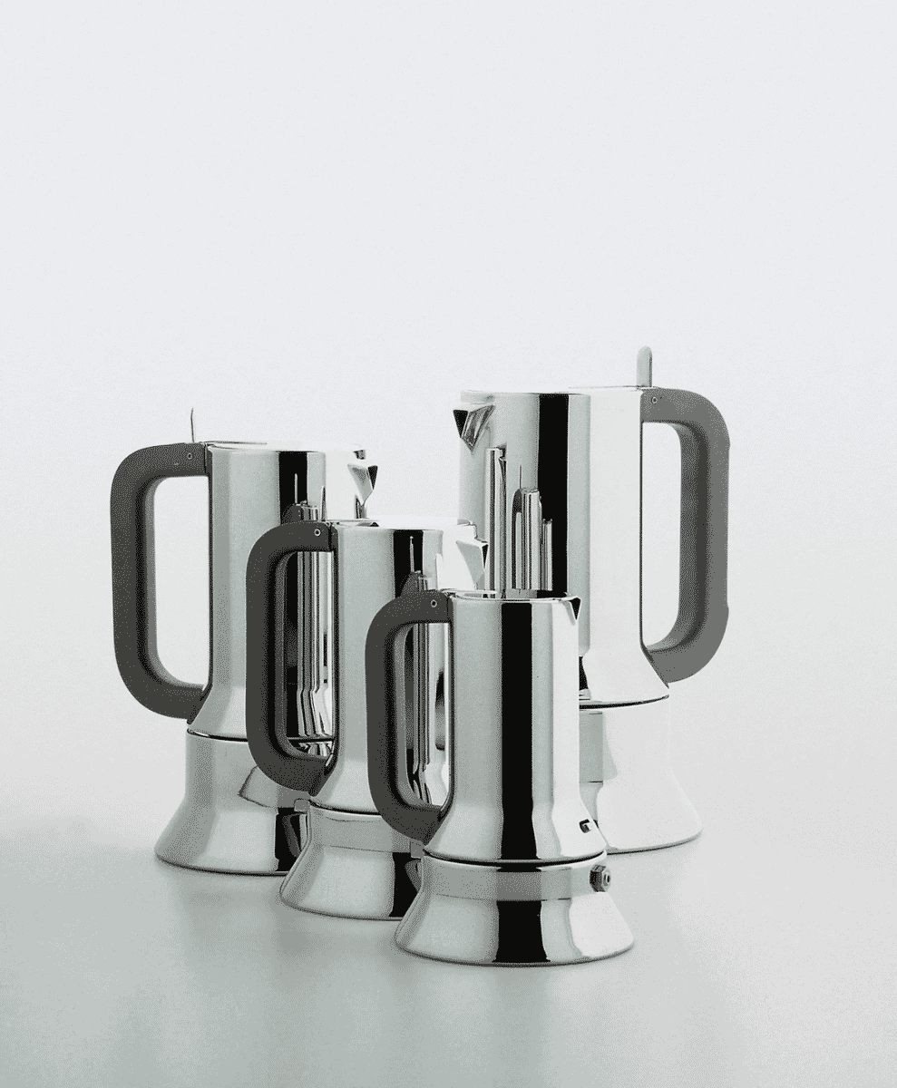 A row of four chrome-finished moka pots with black handles.